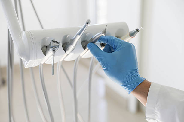 Professional Tooth Extraction technician working in St. Marys, WV